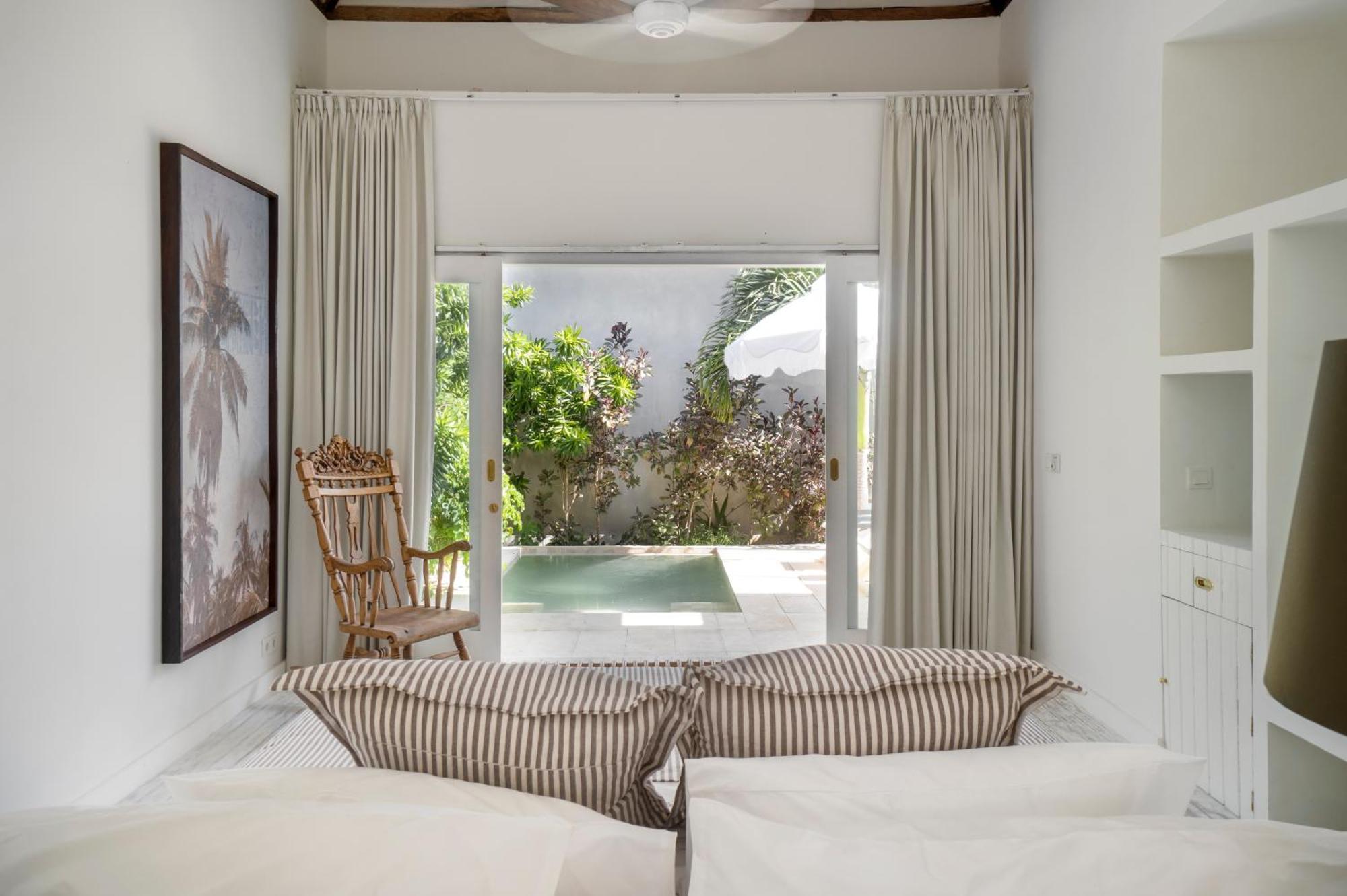Ria Uluwatu, Tropical Chic Hotel Zewnętrze zdjęcie